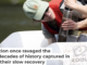 Scientist Aubrey Hillman, one of the authors of this article, extracts a core of mud from the bottom of Black Pond in June 2025. Patrick Dodson/University at Albany